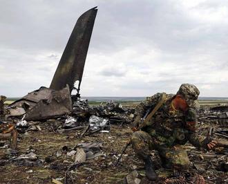 俄罗斯十问乌克兰 MH17坠毁事件上演剧情反转