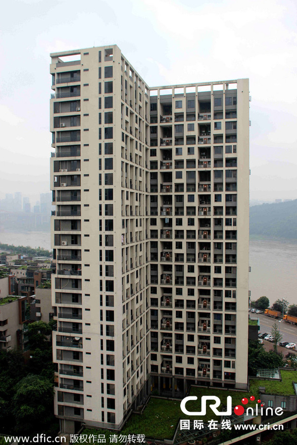 2014年7月1日，重庆一小区跃层小户型每户占地20平米左右，远远望去，好像一个一个的格子，被当地市民戏称为格子楼。图片来源：常旭/东方IC