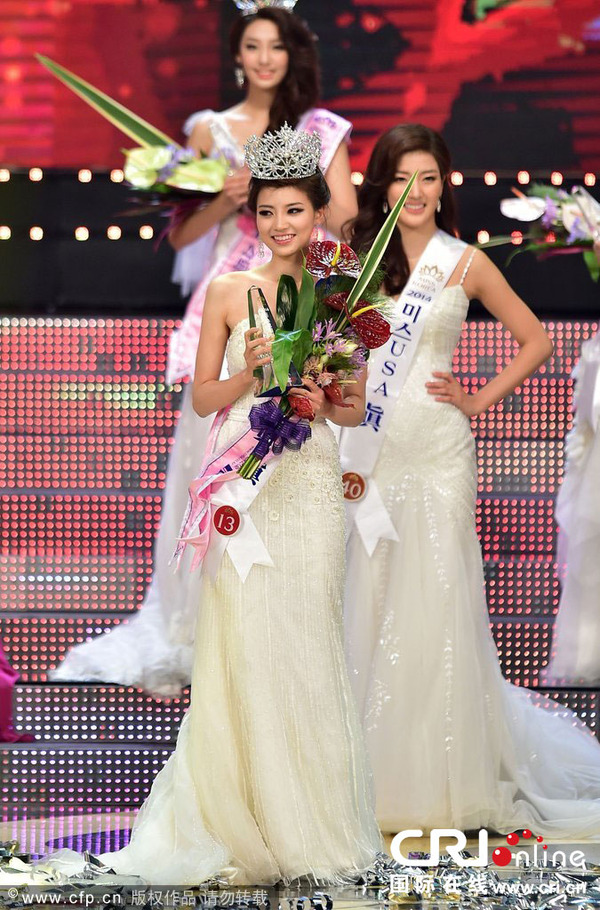 当地时间2014年7月15日，韩国首尔，2014年韩国小姐选美比赛决赛举行，22岁的大学生金书妍（音译）获得冠军。 图片来源：CFP
