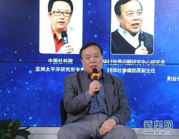 新华网第六届“纵论天下”国际问题研讨会12月22日在北京举行。图为新华社世界问题研究中心研究员、新华社参编部原副主任徐长银发言。新华网 陈竞超 摄