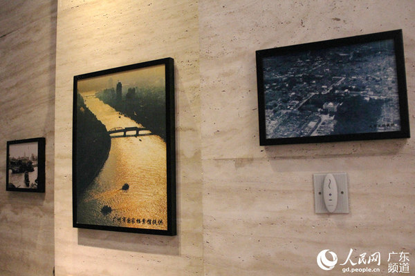 墙上陈列着老广州的照片，诉说羊城的故事。谢嘉琪 摄
