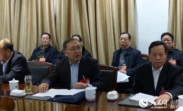 薛延忠与县政协主席共同讨论政府工作报告|全