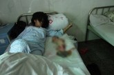 冯建梅说，因为交不起生二胎的四万元罚款，6月2日上午九点，她被镇坪县曾家镇政府的二三十名工作人员押到医院，并在当日下午三点，被医生注射了一针“毒针”，进行引产。在带去医院的车上，由于她不断挣扎，也曾遭到殴打。在医院时，也没有其他家属在场陪同。

