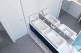 案例五：小空间妙布置
一般卫生间的空间都不会很大，所以优秀的创意及其合理的空间装饰就尤为重要。对于空间较小的卫生间，过多的装饰会显得空间的狭小，所以不如把繁杂的美以简洁的艺术形式表现出来，让卫浴间更具现代特色，更富文化底蕴，也更具人性化的设计。台盆、浴缸、马桶都沿墙而设，正好在中间空出了大片的行走活动空间。