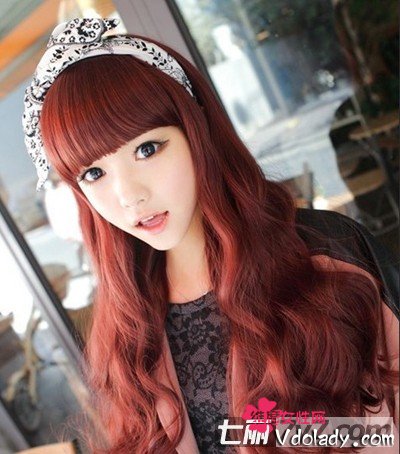 推荐几款齐刘海大波卷发发型帮圆脸妹子修饰胖