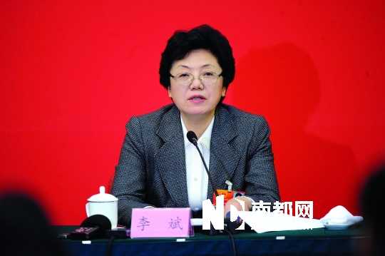 媒体评李斌:性格豪爽认真 招牌笑容示人