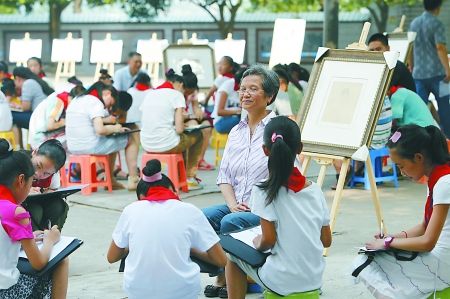 [中国梦]传承百年线描 "童画九美好人"传递正能量