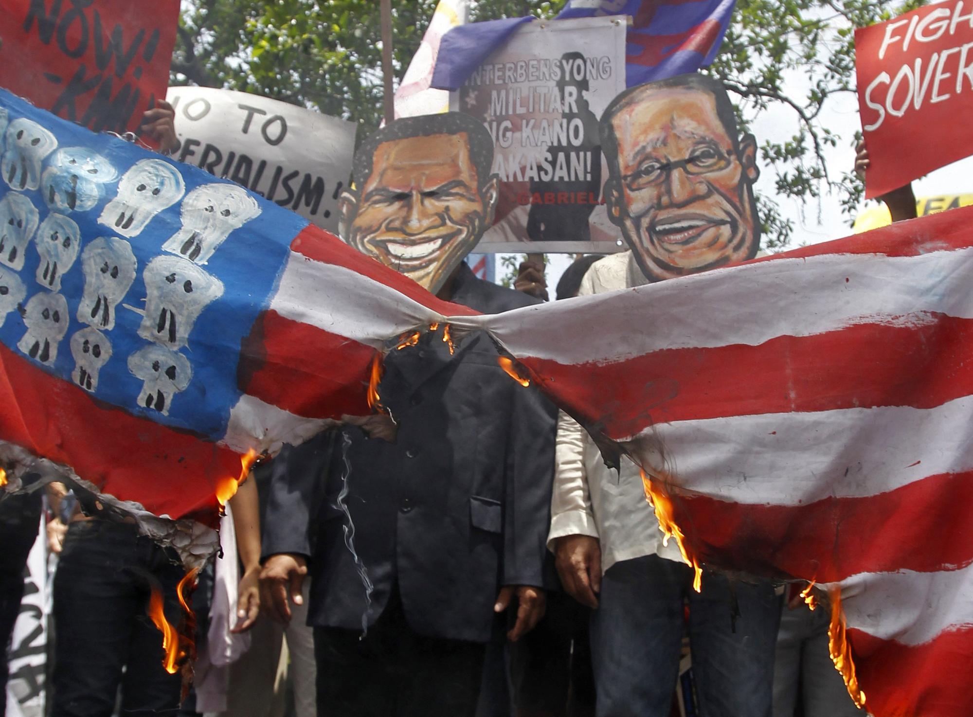 奥巴马首次在白宫会见阿基诺菲律宾大批民众抗议