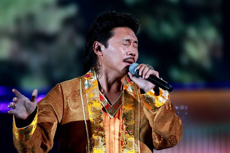 容中尔甲经典唱响高原红获杰出歌曲奖